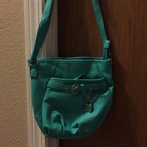 A teal mini purse!